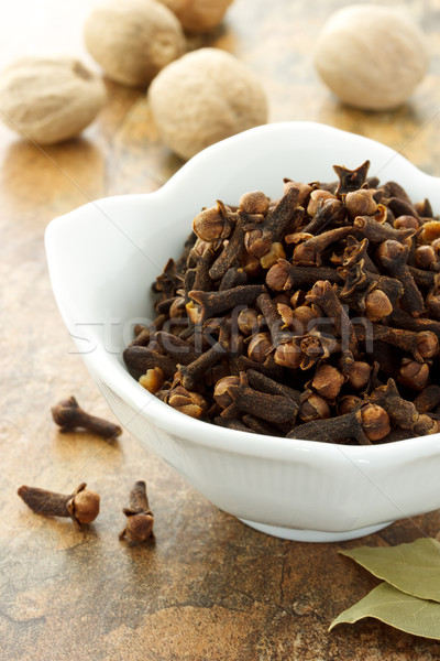 Cloves with nutmegs and bay leave Stock photo © Melpomene