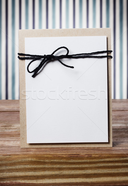 Hand crafted blank card on a striped background Stock photo © Melpomene