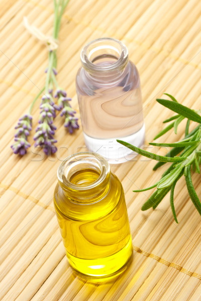 Aroma olaj üvegek gyógynövények levendula rozmaring Stock fotó © Melpomene