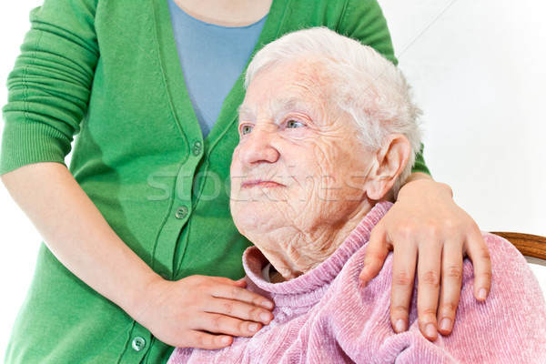 Starszy młoda kobieta wraz biały ręce strony Zdjęcia stock © Melpomene