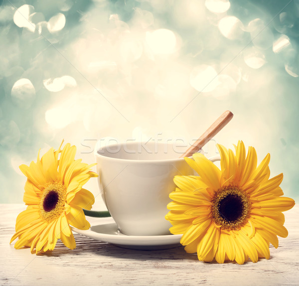 Coffee cup with yellow gerberas  Stock photo © Melpomene