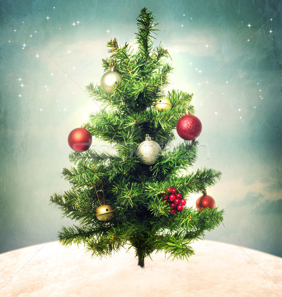 Stock photo: Decorated Christmas tree on hilltop