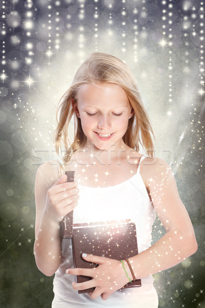 Girl Opening a Gift Box Stock photo © Melpomene