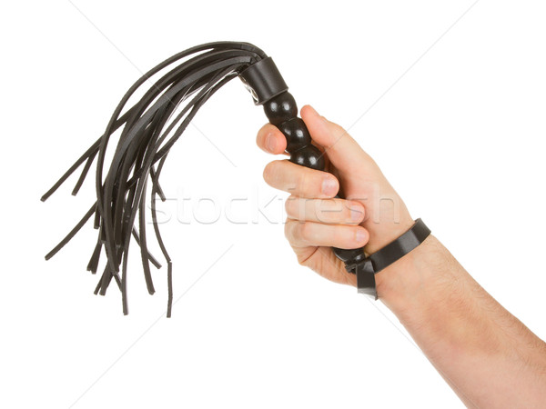 Strict Black Leather Flogging Whip in man's hand Stock photo © michaklootwijk