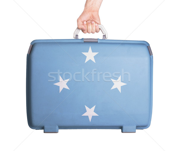 Utilizado plástico maleta impreso bandera Foto stock © michaklootwijk