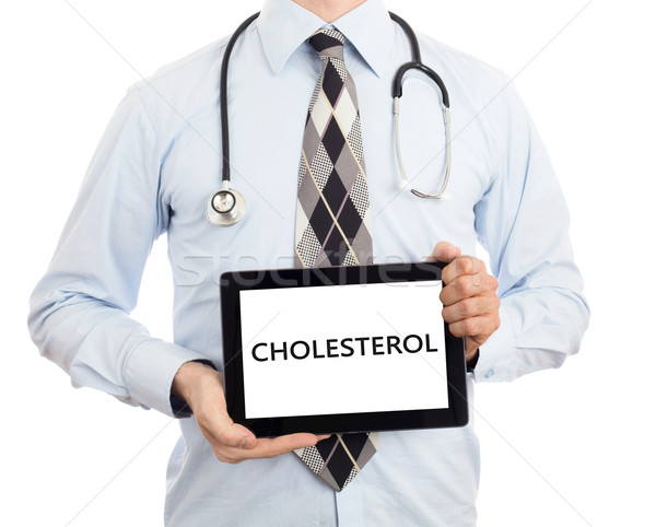 Arzt halten Tablet Cholesterin isoliert weiß Stock foto © michaklootwijk