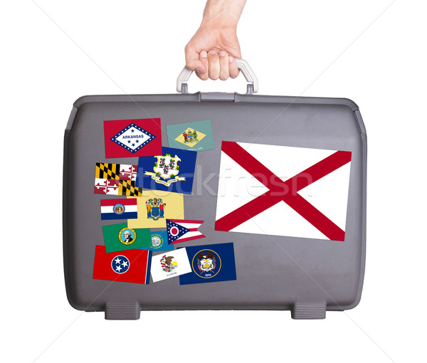 Used plastic suitcase with stains and scratches Stock photo © michaklootwijk