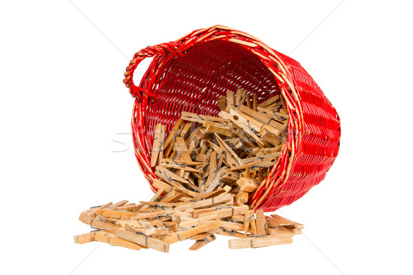 Very old red basket with wooden clothespins Stock photo © michaklootwijk