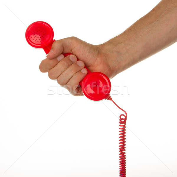 Man holding a red telephone Stock photo © michaklootwijk