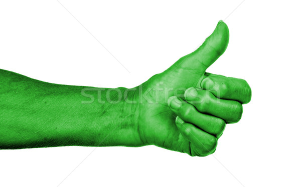 Old woman with arthritis giving the thumbs up sign Stock photo © michaklootwijk