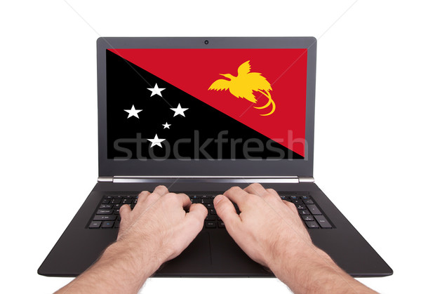 Сток-фото: рук · рабочих · ноутбука · Папуа-Новая · Гвинея · экране