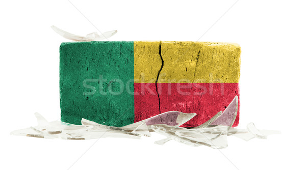 Cegły stłuczone szkło przemocy banderą Benin ściany Zdjęcia stock © michaklootwijk