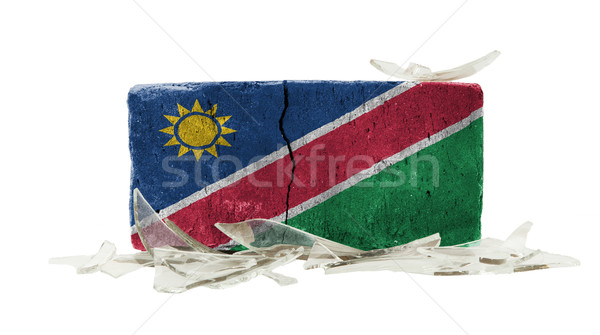 Ziegel Glasscherben Gewalt Flagge Namibia Wand Stock foto © michaklootwijk