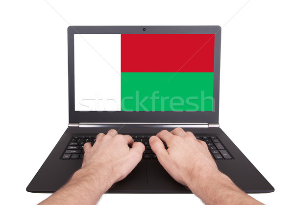 Handen werken laptop Madagascar tonen scherm Stockfoto © michaklootwijk