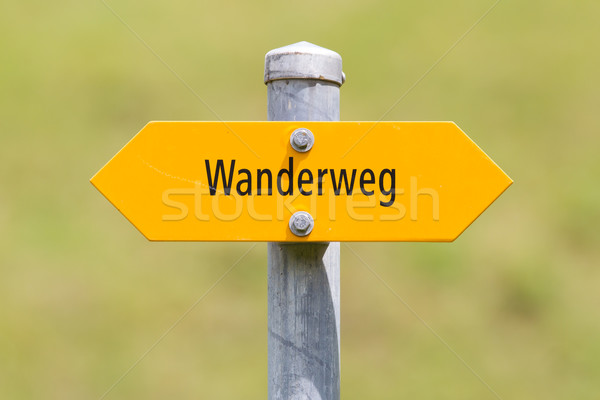 Bergwanderweg sign in the mountains, navigation for hikers Stock photo © michaklootwijk