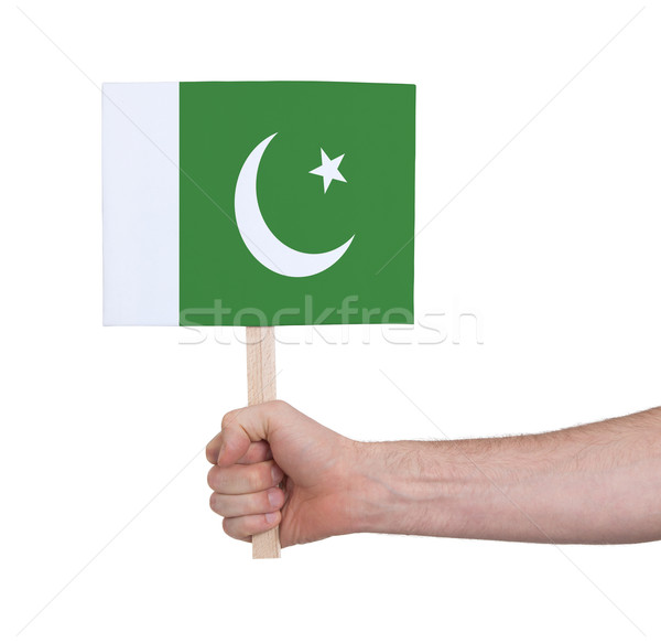 Kéz tart kicsi kártya zászló Pakisztán Stock fotó © michaklootwijk
