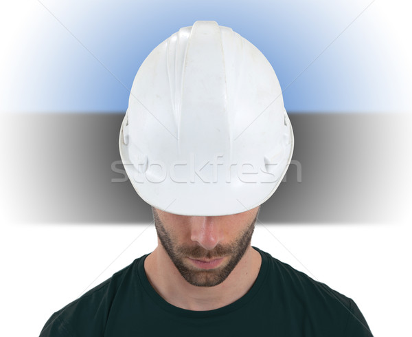 Engineer with flag on background - Estonia Stock photo © michaklootwijk