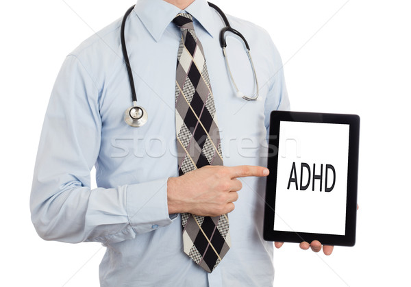Doctor holding tablet - ADHD Stock photo © michaklootwijk