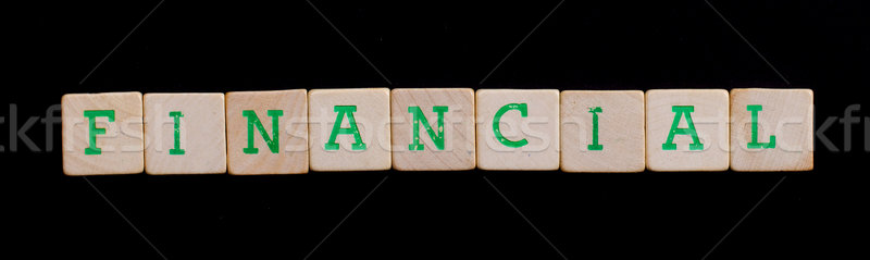 Letters on wooden blocks (financial) Stock photo © michaklootwijk