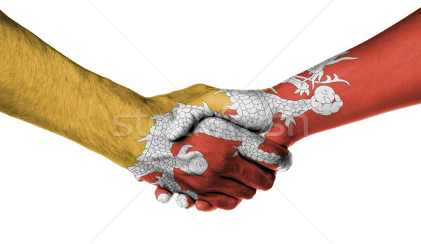 Foto stock: Homem · mulher · aperto · de · mãos · bandeira · padrão · Butão
