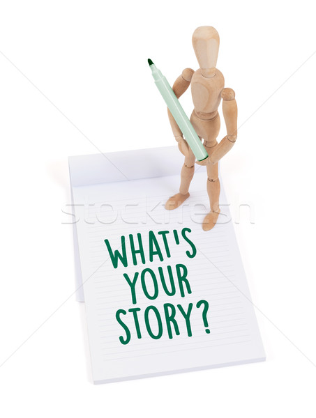 Wooden mannequin writing - What's your story Stock photo © michaklootwijk