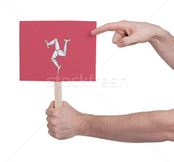 Stock photo: Hand holding small card - Flag of Isle of man