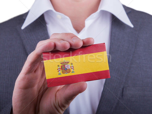 Businessman showing card, matte paper effect Stock photo © michaklootwijk