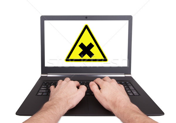Man working on laptop, irritation Stock photo © michaklootwijk