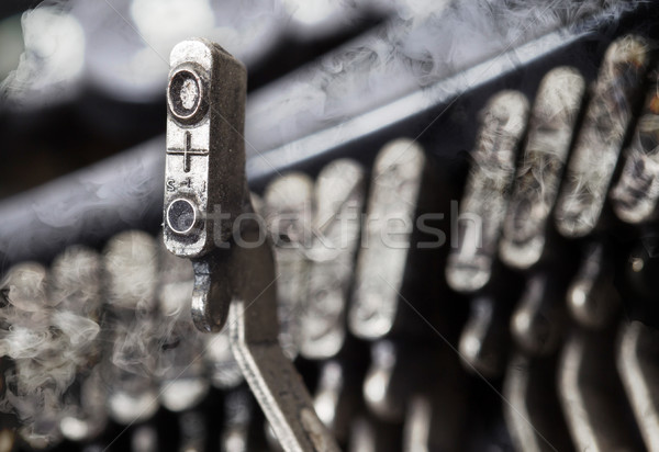 O hammer - old manual typewriter - mystery smoke Stock photo © michaklootwijk