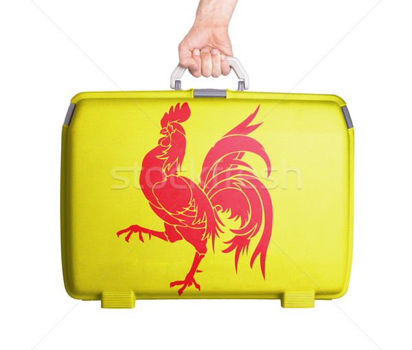 Stock photo: Used plastic suitcase with stains and scratches
