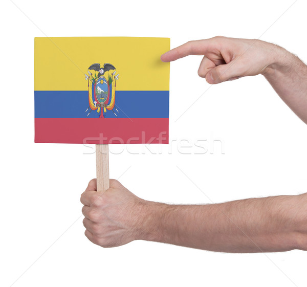 Hand holding small card - Flag of Ecuador Stock photo © michaklootwijk
