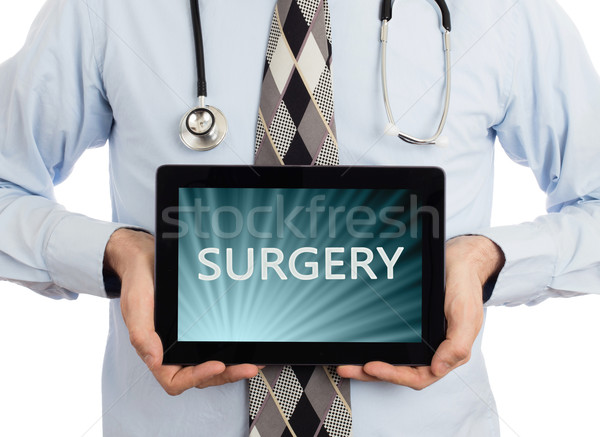 Doctor holding tablet - Surgery Stock photo © michaklootwijk