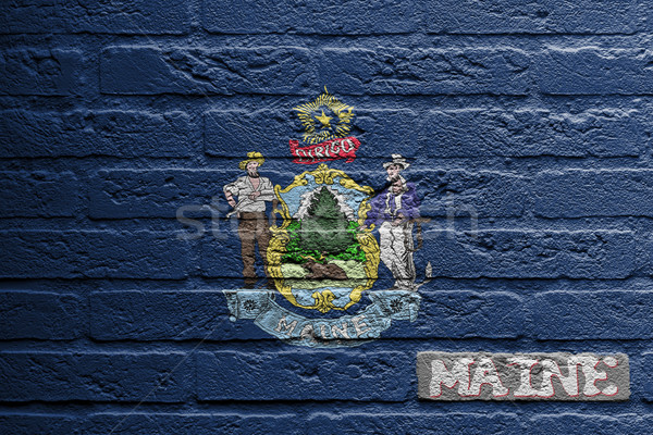 Brick wall with a painting of a flag, Maine Stock photo © michaklootwijk
