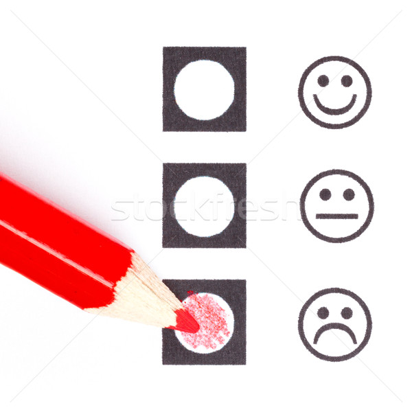 Stock photo: Red pencil choosing the right smiley