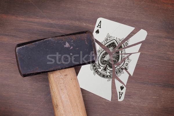 Hammer with a broken card, ace of spades Stock photo © michaklootwijk