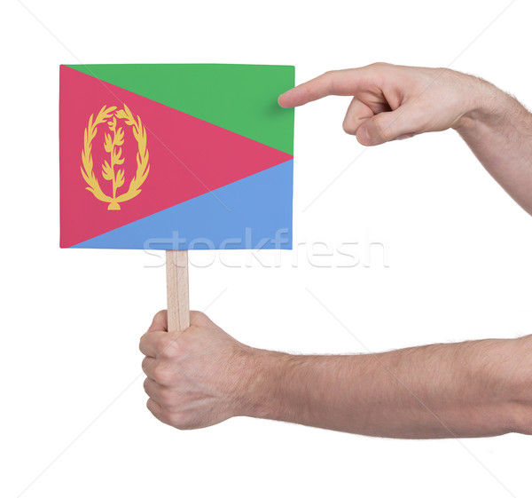 Stock photo: Hand holding small card - Flag of Eritrea