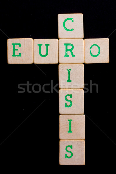 Letters on old wooden blocks (euro, crisis) Stock photo © michaklootwijk