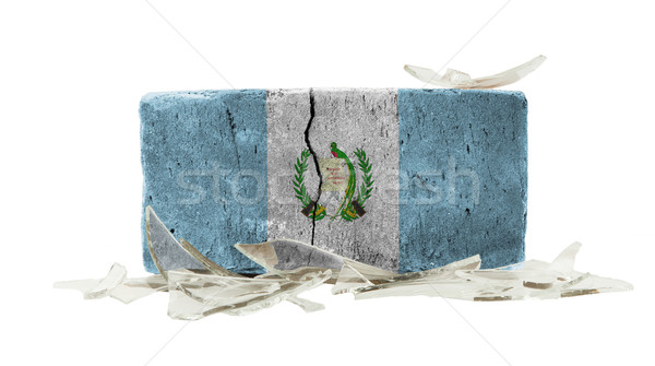 Tijolo cacos de vidro violência bandeira Guatemala parede Foto stock © michaklootwijk