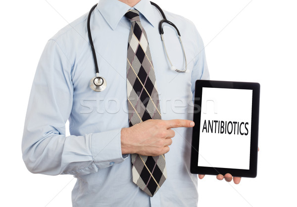 Stock foto: Arzt · halten · Tablet · Antibiotika · isoliert · weiß