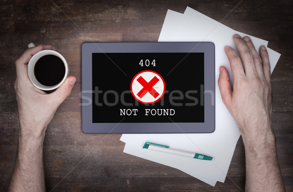 Tablet displaying an error, 404 Stock photo © michaklootwijk