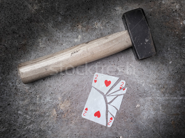 Hammer with a broken card, two of hearts Stock photo © michaklootwijk