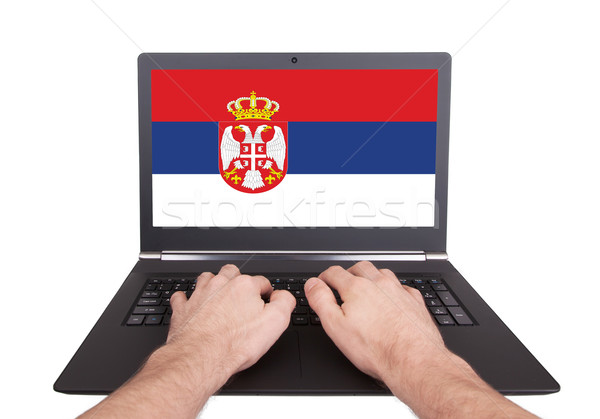 Eller çalışma dizüstü bilgisayar Sırbistan ekran Stok fotoğraf © michaklootwijk