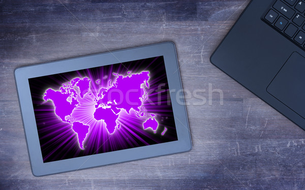 World map on a tablet Stock photo © michaklootwijk