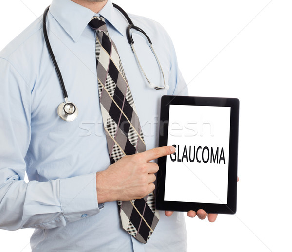 Doctor holding tablet - Glaucoma Stock photo © michaklootwijk