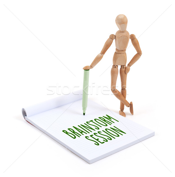 Wooden mannequin writing - Brainstorm session Stock photo © michaklootwijk