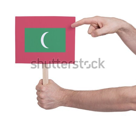 Hand holding small card - Flag of Maldives Stock photo © michaklootwijk