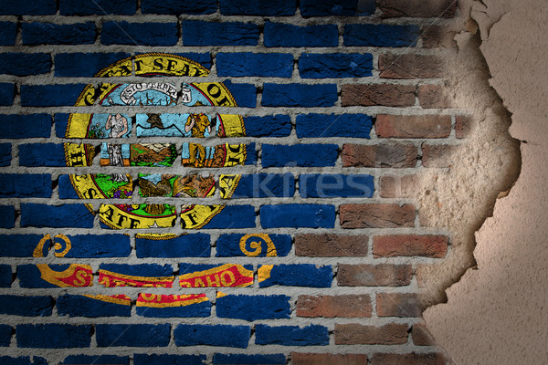 Dunkel Backsteinmauer Gips Idaho Textur Flagge Stock foto © michaklootwijk