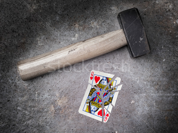 Hammer with a broken card, queen of hearts Stock photo © michaklootwijk