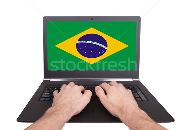 Kezek dolgozik laptop Brazília mutat képernyő Stock fotó © michaklootwijk