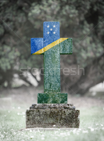 [[stock_photo]]: Pierre · tombale · cimetière · Îles · Salomon · vieux · patiné · pavillon